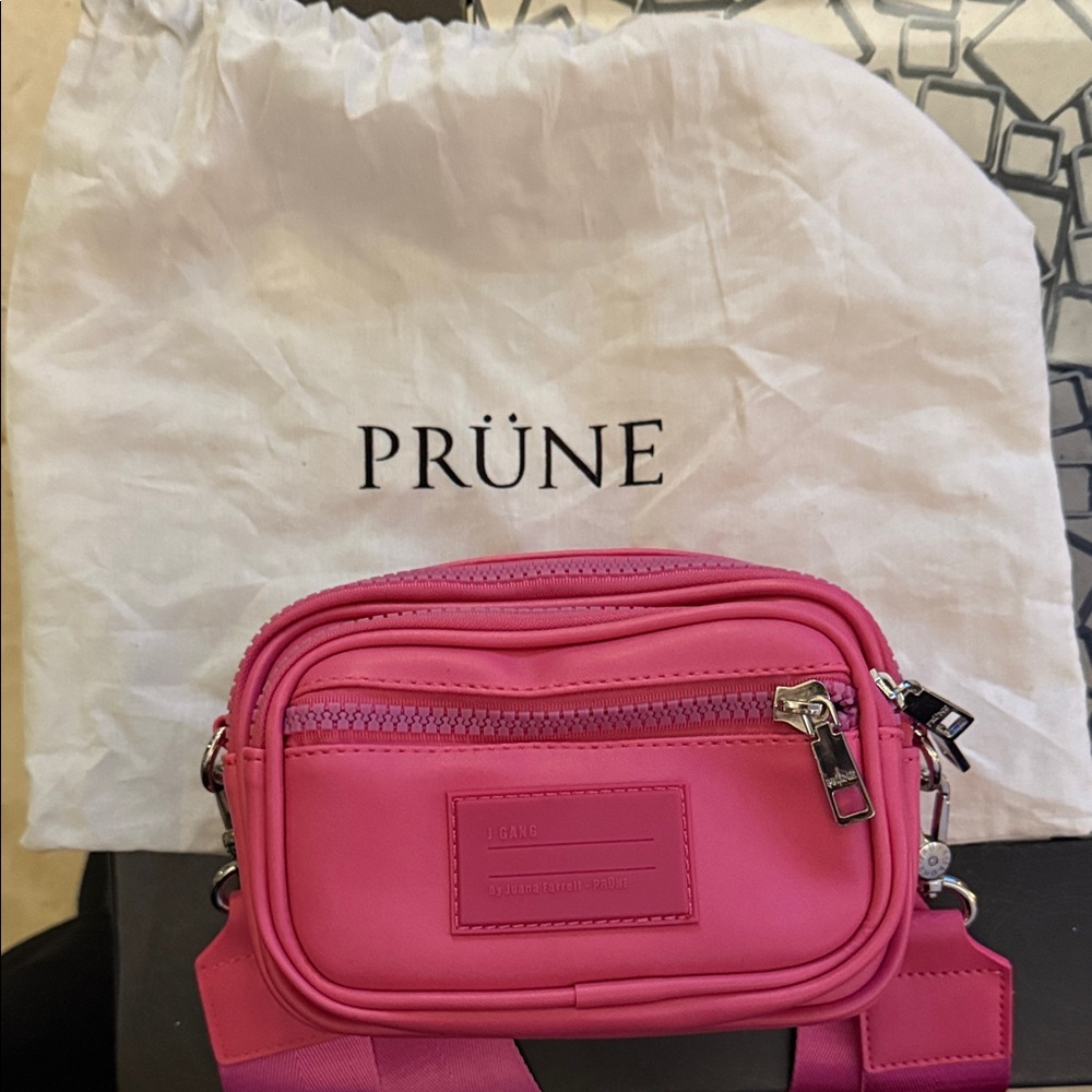 Pink Crossbody Bag and waist bag. Prüne
Never ‘ve been used .
